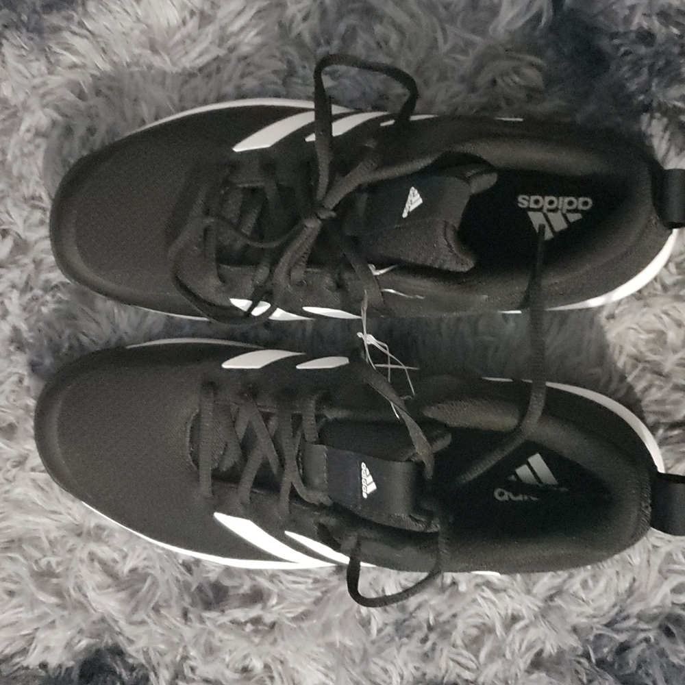 Brand new Adidas size 10